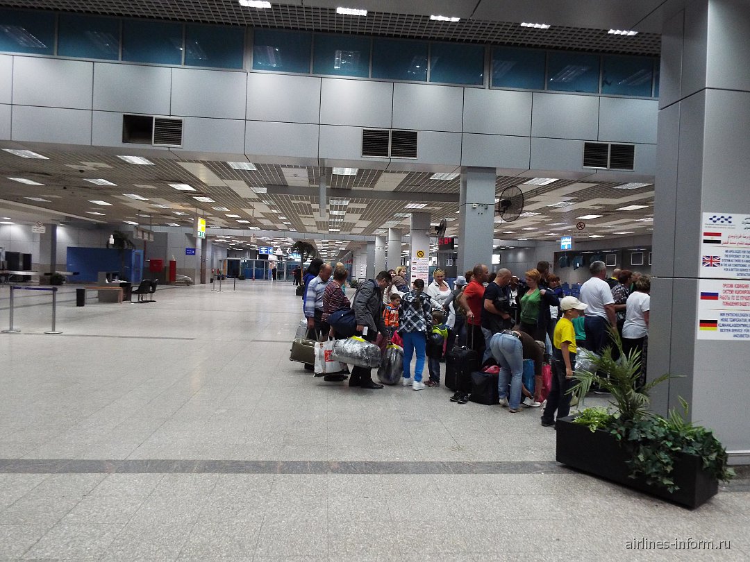 Flight terminal. Аэропорт Хургада 2 терминал. Аэропорт зал регистрации. Аэропорт Хургады стойки регистрации. Хургада аэропорт зал прилета.